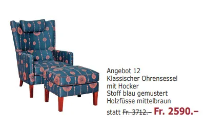 Klassischer Ohrensessel mit Hocker und blau gemustertem Stoff